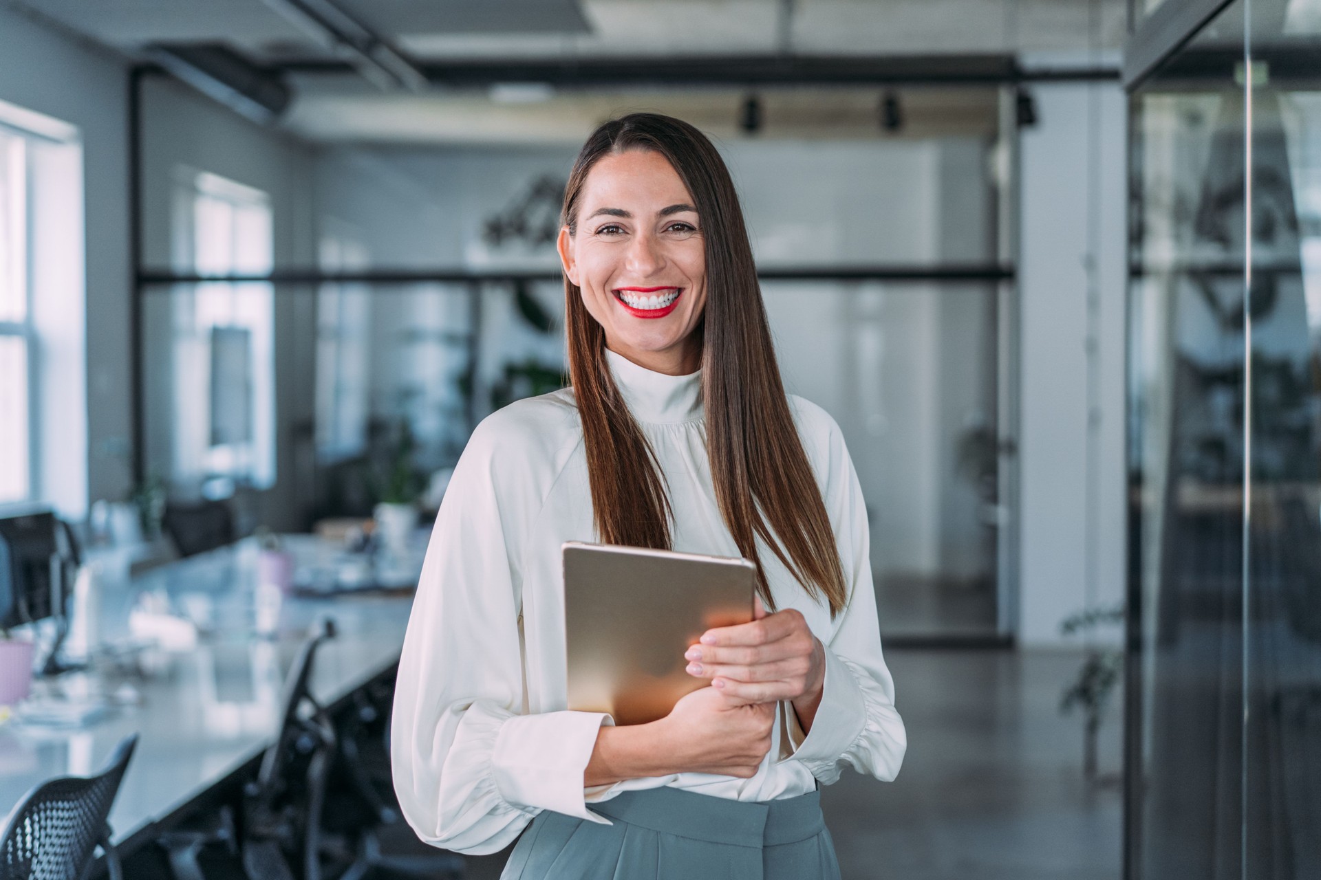 Confident businesswoman in modern office.